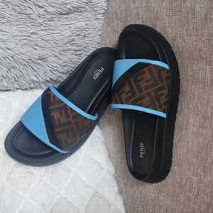 Fendi Diagonal Slides
BrownFF jacquard leather slides